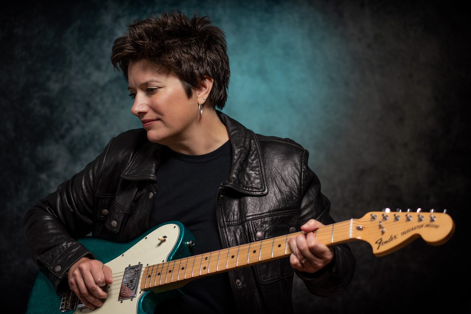 Jen Edds with a guitar