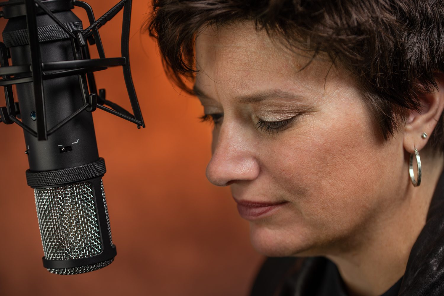 Jen Edds at a microphone